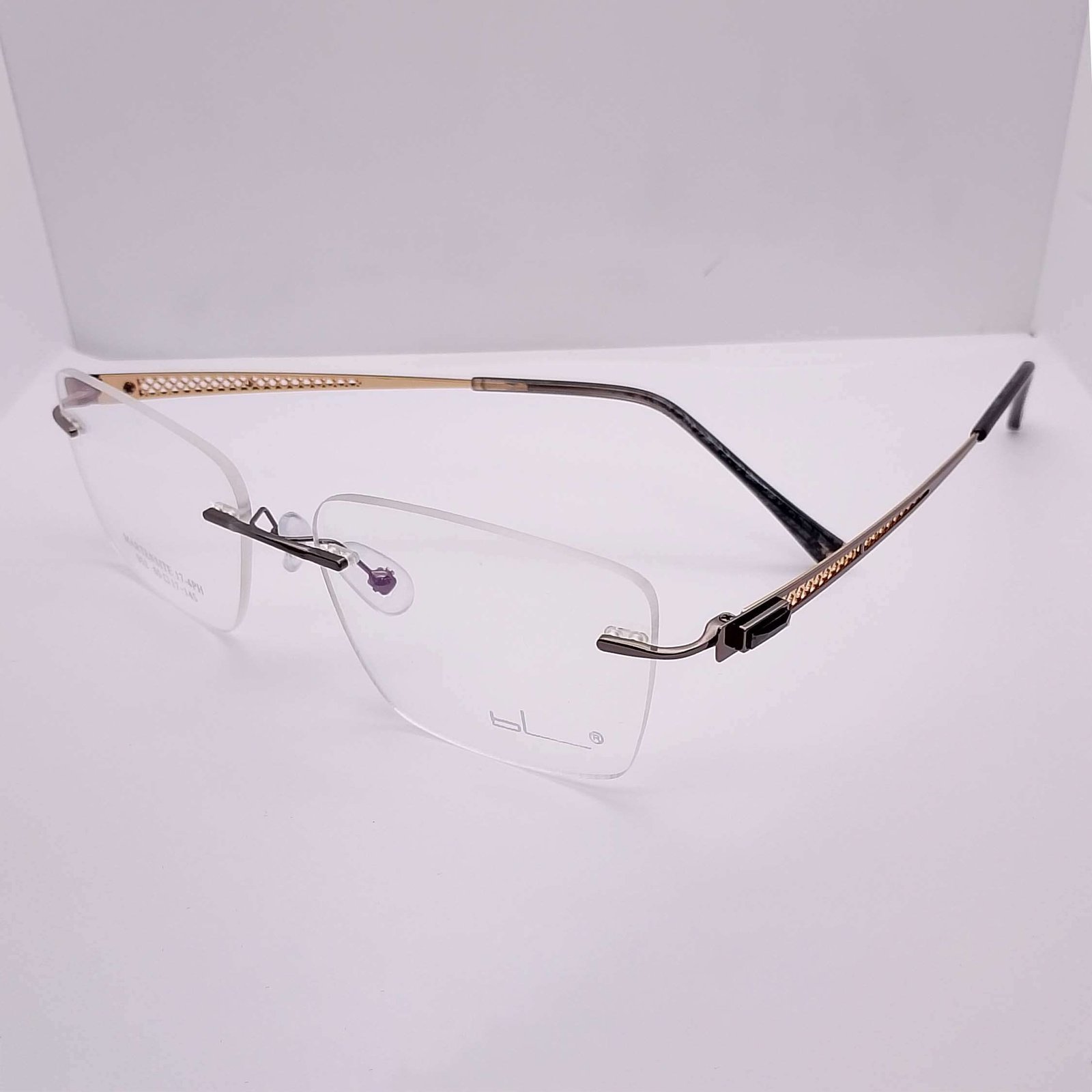 D52 Martensite Rimless Chocolate eyeglasses — main view | Nine Optic Bangladesh
