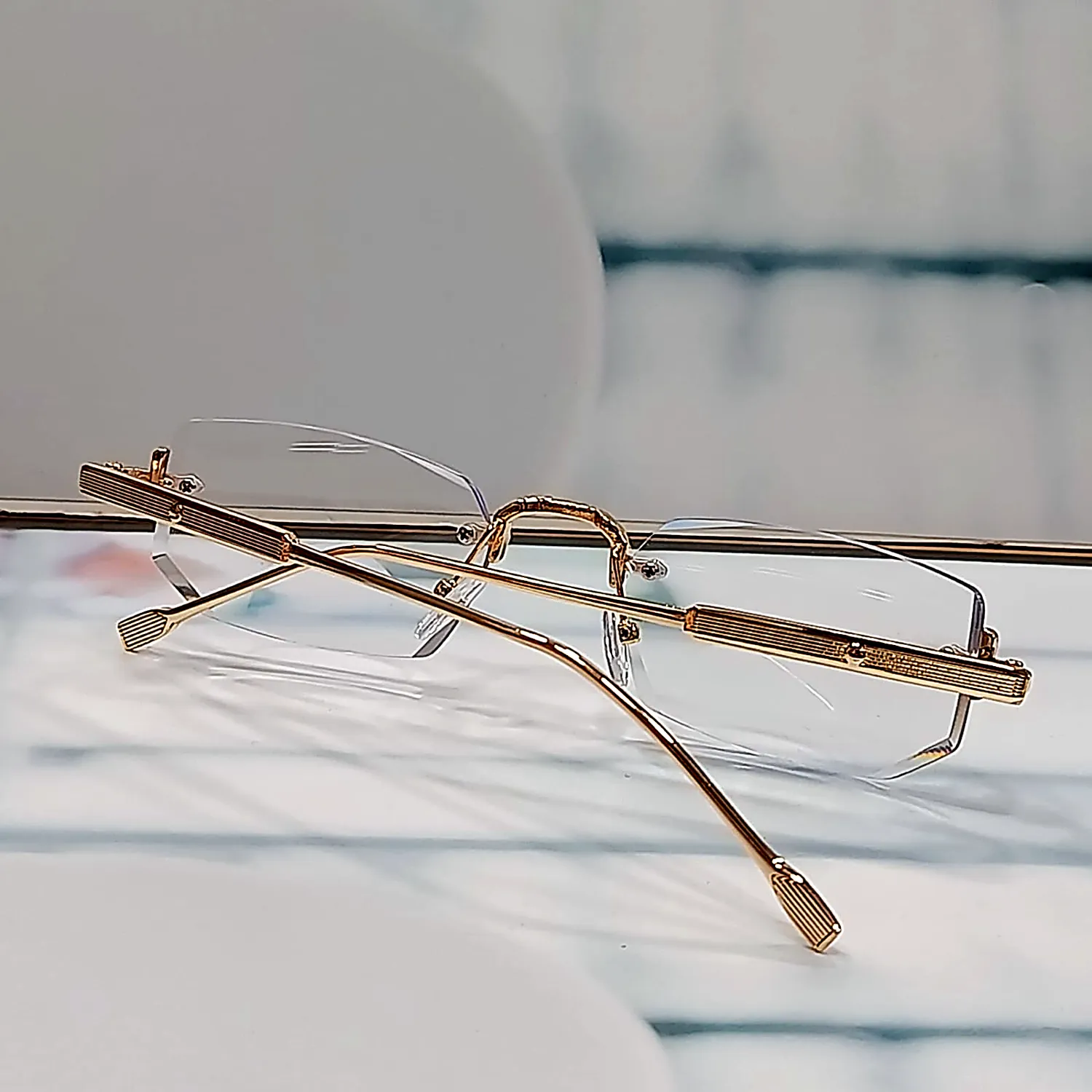 N-102 Elite Gold reading glasses — engraved gold temple detail