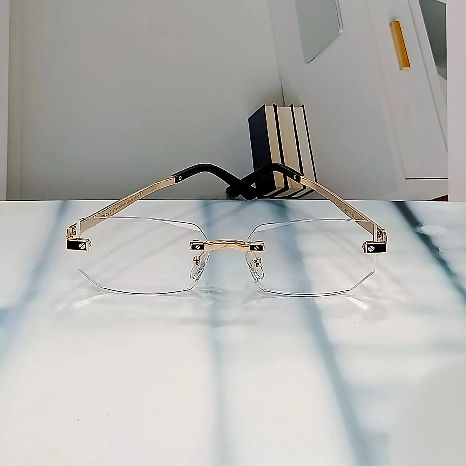 Nine Optic N-103 Regent Gold gold rimless reading glasses — front view